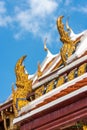 Detail of the traditional ornaments on a roof at the Wat Phra Kaew Palace, also known as the Emerald Buddha Temple. Bangkok, Thail Royalty Free Stock Photo