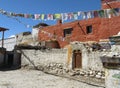Detail of traditional Tibetan house and prayer flags