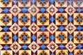 Detail of traditional tiles on facade of old house Royalty Free Stock Photo