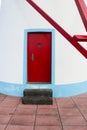 Red windmill door. Royalty Free Stock Photo