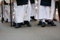 detail of the trditional dresses of christian confraternity members