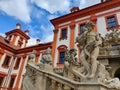 Detail of Troja castle seen together with staircase and sculptures on it during nice summer day Royalty Free Stock Photo