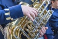 Detail of a tuba being played by a musician in a Holy Week procession Royalty Free Stock Photo