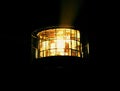 Detail of turning lamp in lighthouse. Detail of Fresnel lens.