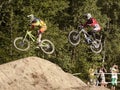 Detail of two bikers on jumps - editorial