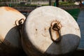 Detail of two large metal buoys.