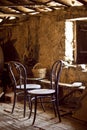 Detail of two old thonet chairs in a cabin.