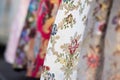 Detail of the typical dress of the fallas of Valencia. Close up photograph focused on one of the skirts with floral motifs