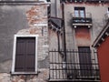 Detail of typical old crumbling house in venice with Royalty Free Stock Photo