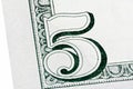 Detail of U.S. five dollar bill, isolated end stacked. Royalty Free Stock Photo