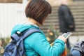 Unidentified woman is chatting on the cellphone