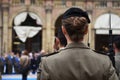 Detail with uniformed women standing during the military ceremony in Bologna