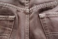 Detail from an used brown jeans Royalty Free Stock Photo