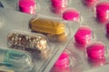 Colorful pills in transparent medicine capsule, nanotechnology future medicine concept Royalty Free Stock Photo