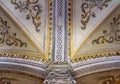 Detail of the vaulted ceiling of the chapel decorated with paintings and religious frescoes of angels and allegorical figures with