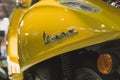 Detail of Vespa scooter on display at EICMA 2014 in Milan, Italy