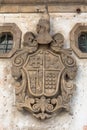 Detail view at a classic traditional and ornamented coat of arms on a old building