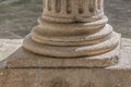 Detail view of a ionic style base column, romanesque columns gallery Royalty Free Stock Photo