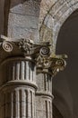 Detail view of a ionic style capital column, romanesque columns gallery