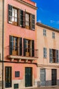 Rustic mediterranean house with open windows shutters an balcony Royalty Free Stock Photo