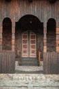 Detail view of old massive huge church wooden ancient door Royalty Free Stock Photo