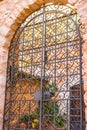Beautiful ornated iron gate of mediterranean house entrance