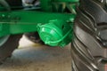 Detail view of the pneumatic brake chamber of an agricultural semi-trailer machine. Royalty Free Stock Photo