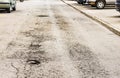 Damaged asphalt road street with pot hole Royalty Free Stock Photo