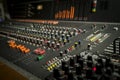 Detail view of Professional multitracks Studio mixer for audio recording. Royalty Free Stock Photo