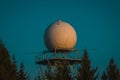 Detail view of a rain radar or meteorological doppler radar for measuring precipitation in early morning hours during sunrise on Royalty Free Stock Photo