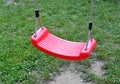 Red baby swing Royalty Free Stock Photo