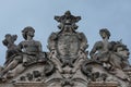 Detail view of the sculptural group over the governament Palace of Ascoli Piceno, Marche region, Italy