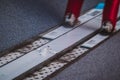 Detail view of a ski jumper on a large hill Royalty Free Stock Photo