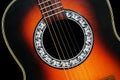 detail view of the sound hole and strings of an acoustic guitar Royalty Free Stock Photo