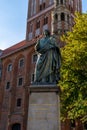 Detail view of the statue of Nicolaus Copernicus at the town hall in the historic city center of Torun