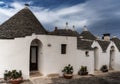 detail view of typical Trulli houses and huts in the Rione Monti District of Alberobello