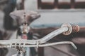 Detail of a Vintage Bike HandleBar with Background Bokeh Royalty Free Stock Photo