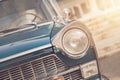 Detail of a vintage car. Close up of headlight retro classic car. Vintage effect style pictures. Classic car Royalty Free Stock Photo