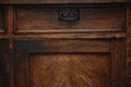 Detail of a vintage cupboard sideboard - drawers with metal handle. vintage retro furniture closeup Royalty Free Stock Photo