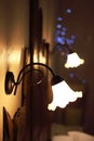 Detail of vintage lamps placed over a bed of a luxury room in a country cottage hotel close to Girona, Catalonia, Spain Royalty Free Stock Photo