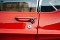 Detail of a vintage red car