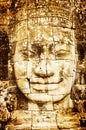 Detail of vintage stone face in the Bayon temple at Angkor Wat Royalty Free Stock Photo