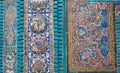 Detail of a wall of an old iranian mosque with mosaics and tiled pieces in persian style, Kermanshah, Iran.