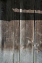 Detail of weathered used wooden planks with sunlight and shadow