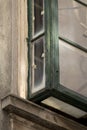 Detail of weathered vintage wooden green window in old town Sibenik, usually called bay, garden or greenhouse window Royalty Free Stock Photo