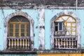 Detail of weathered windows of a vintage house in the Fontainhas area of Panjim
