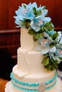 Detail of wedding cake with blue flowers Royalty Free Stock Photo
