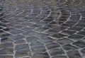 Detail of wet cobblestone road