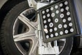 Detail of wheel alignment machine camera Royalty Free Stock Photo