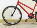 Detail of the wheel on old red bicycle Royalty Free Stock Photo